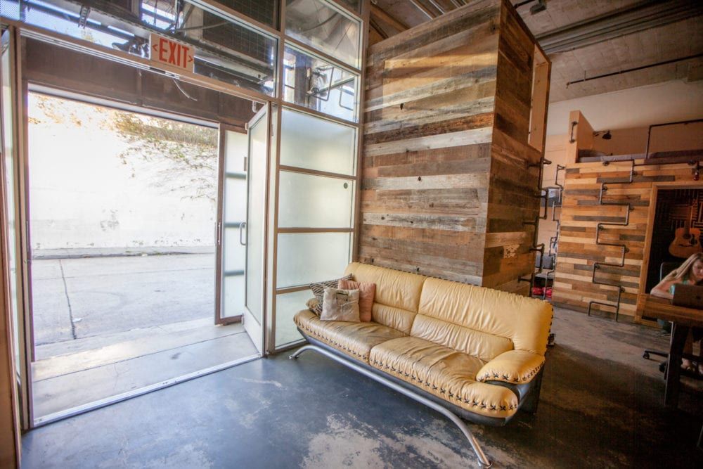 Open doorway with leather couch.